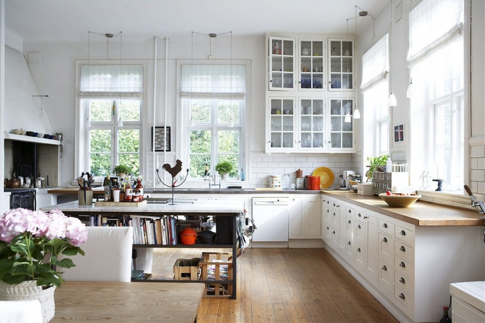 white kitchen cabinets with glass doors